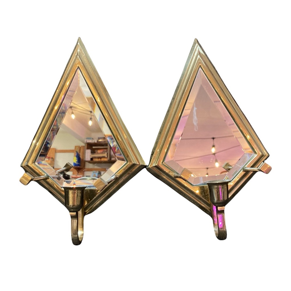 MCM patching pair of mirrored sconces. Beautiful shape and design.